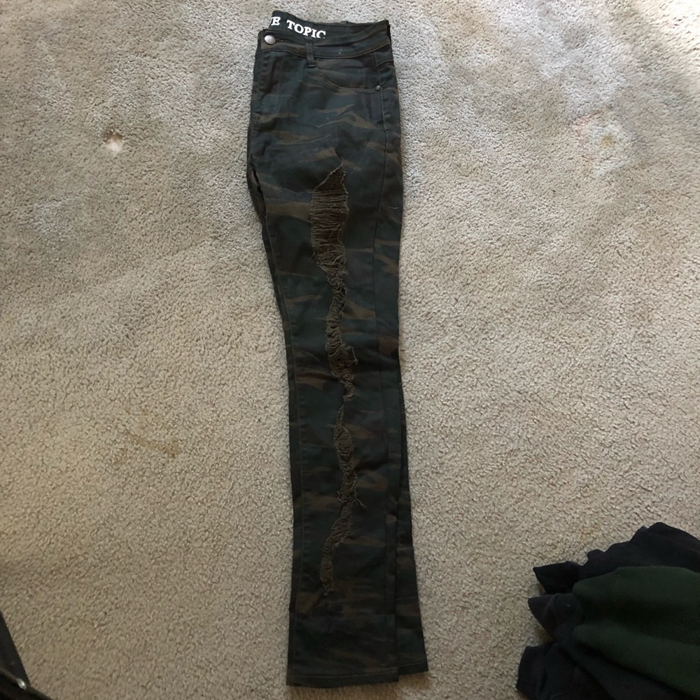ripped camo jeans
